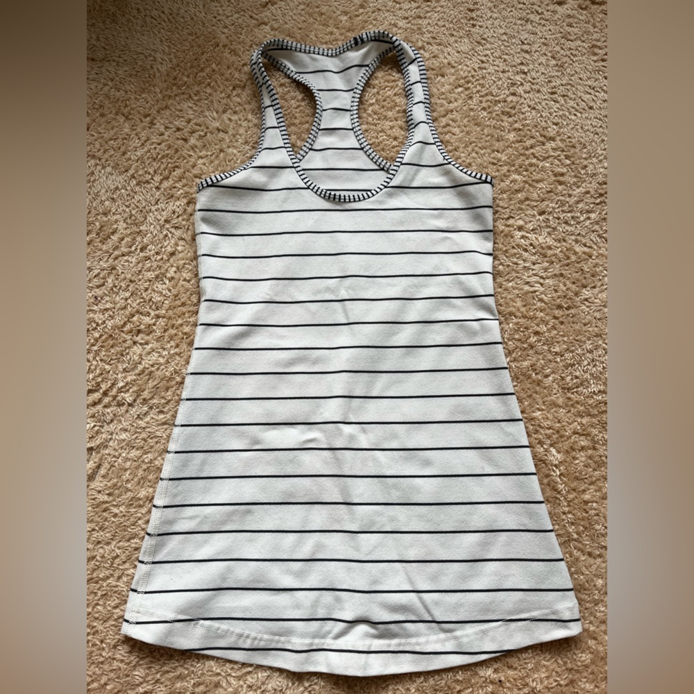 Four size 4 lululemon tanks.  🍋🍋
